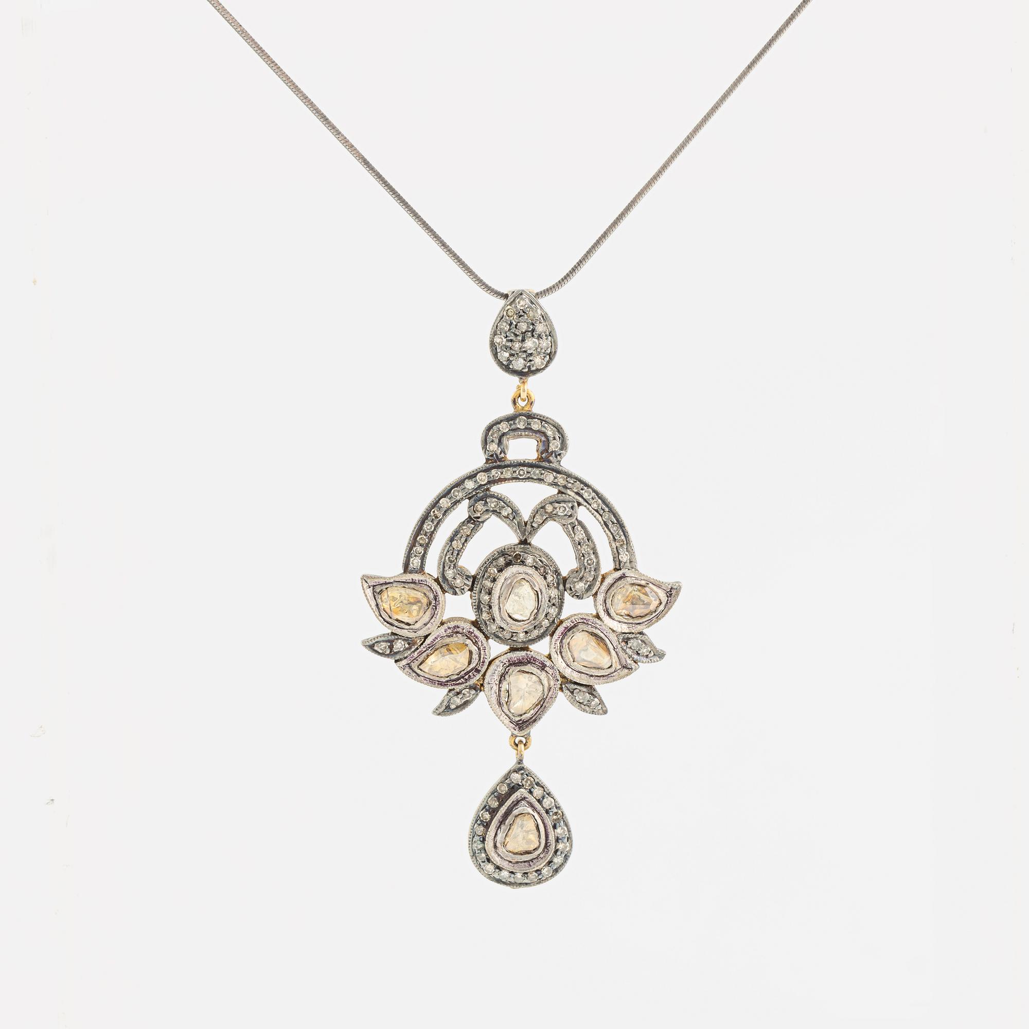 A faceted diamond necklace.