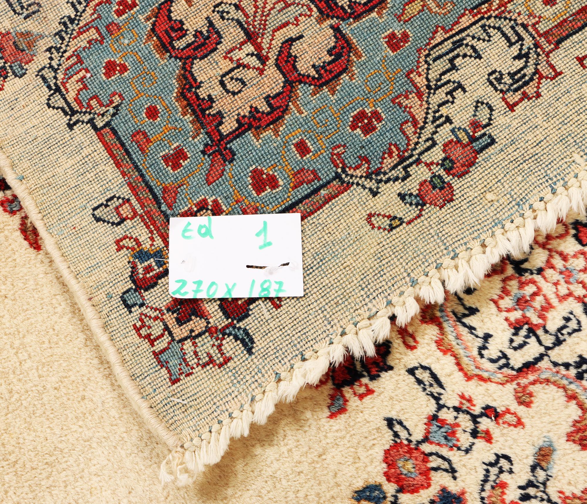 A Kerman carpet, c. 270 x 187 cm.
