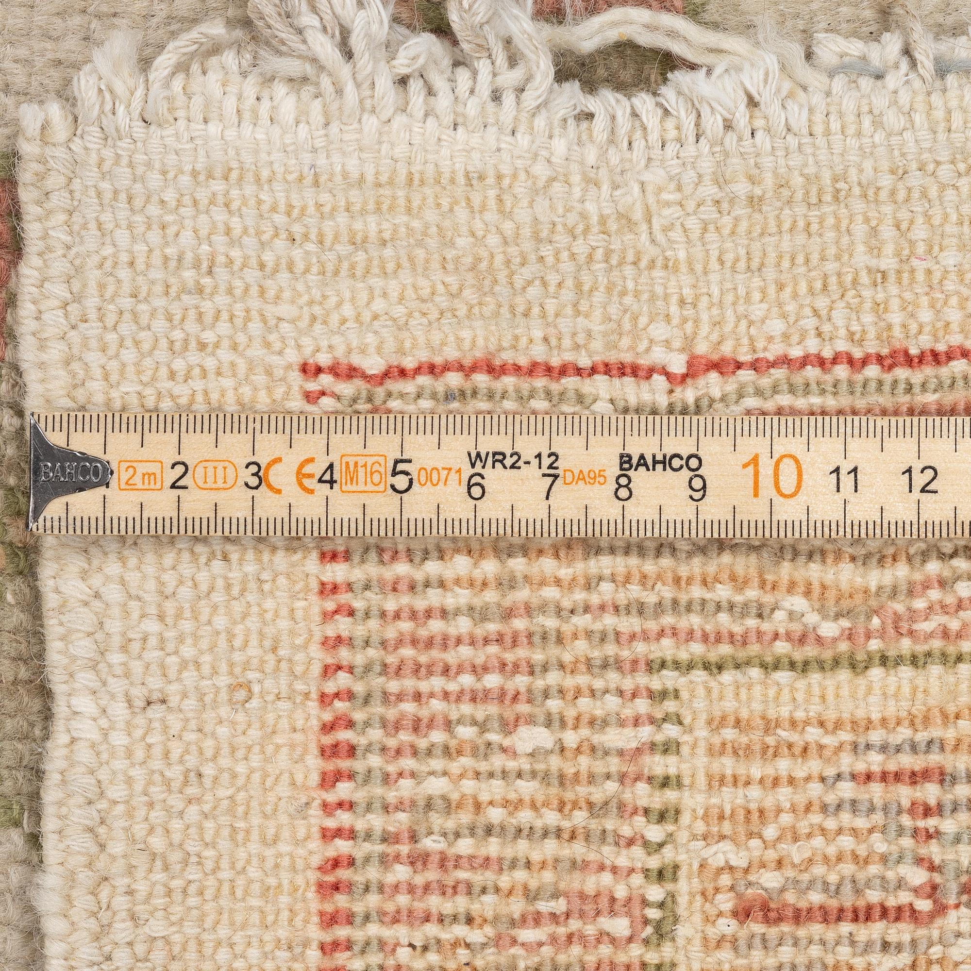 An antique Ushak carpet, West Anatolia, c. 486 x 391 cm.