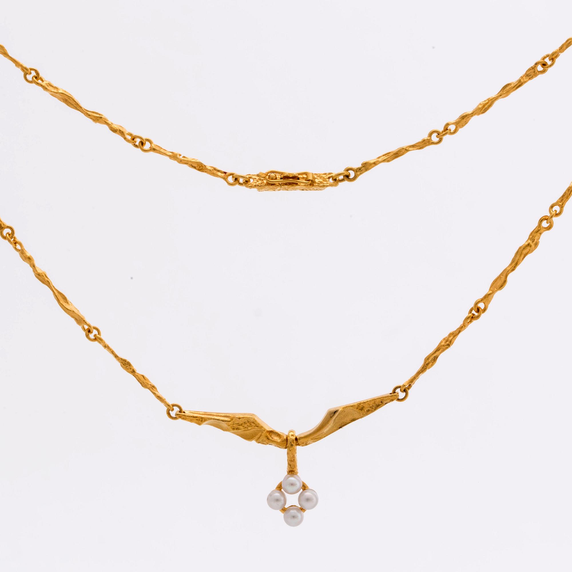 LAPPONIA, parure, 18K gold and cultured pearls approx 3 mm, design Björn Weckström 1999, certificate and original box.