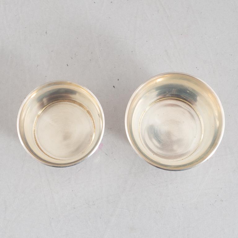 A set of sixteen Swedish silver cups, marks of K. Torndals Juvelerare AB, Stockholm 1955-1962.