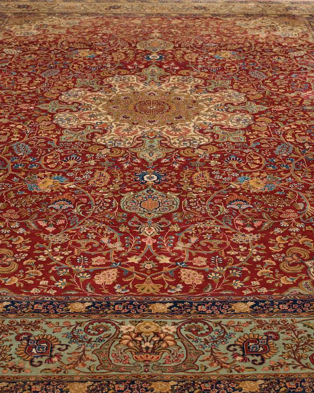 MATTO, a semi-antique Tabriz, ca 339 x 253,5 cm.