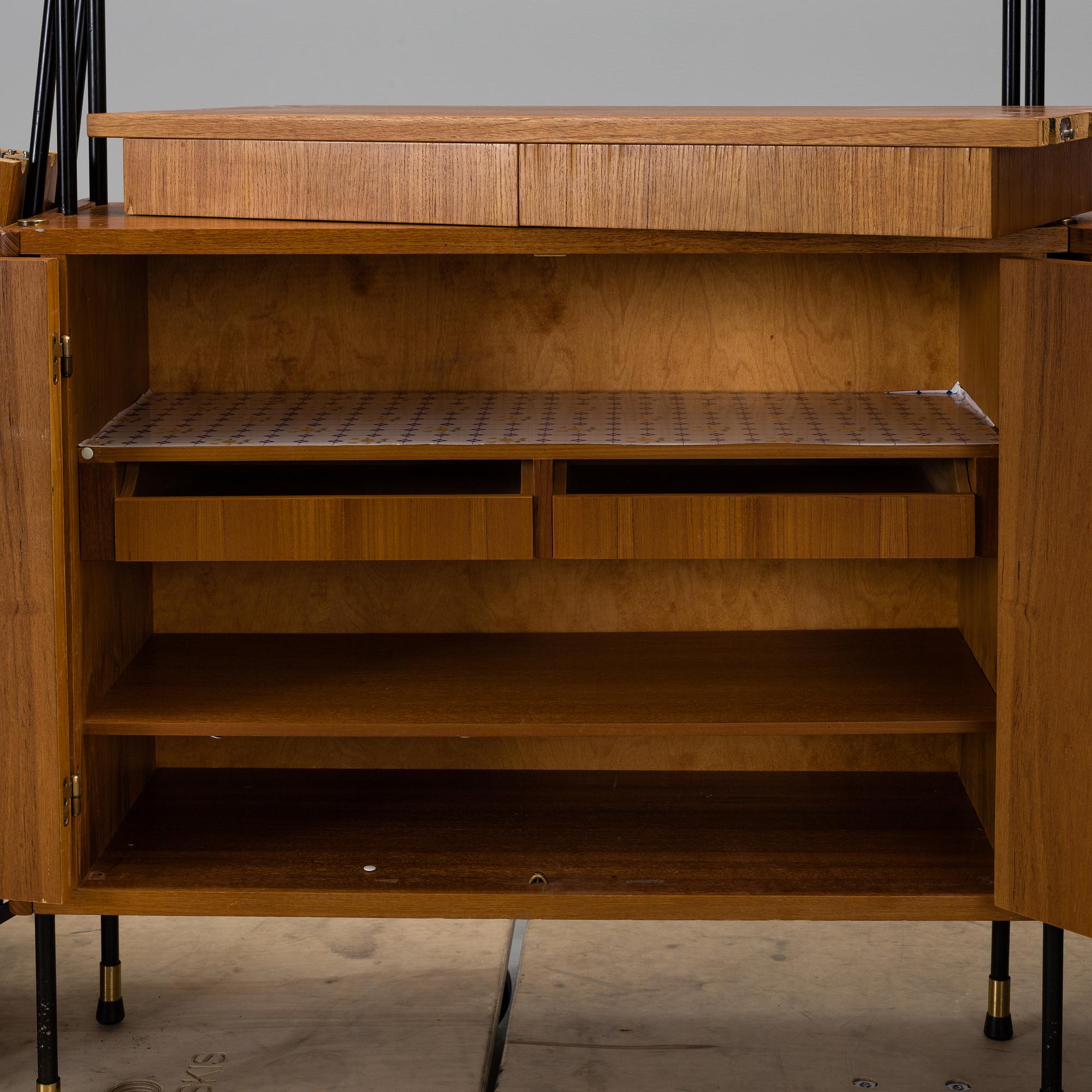 A mid 20th century "Prydno" shelving system by Bröderna Gustafsson Möbelfabrik, Virserum.