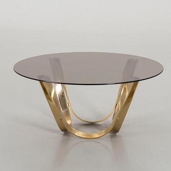 A GLASS TOP COFFEE TABLE BY ROGER SPRUNGER FOR DUNBAR USA.