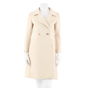 LOUIS FÉRAUD, a light beige wool blend coat, from 1968.