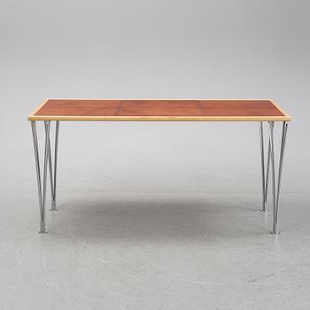 A birch and leather dining table produced by Mathsson International, 21th century.