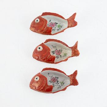 A set of three iron red 'carp-dishes', Japan, first part of the 20th century.