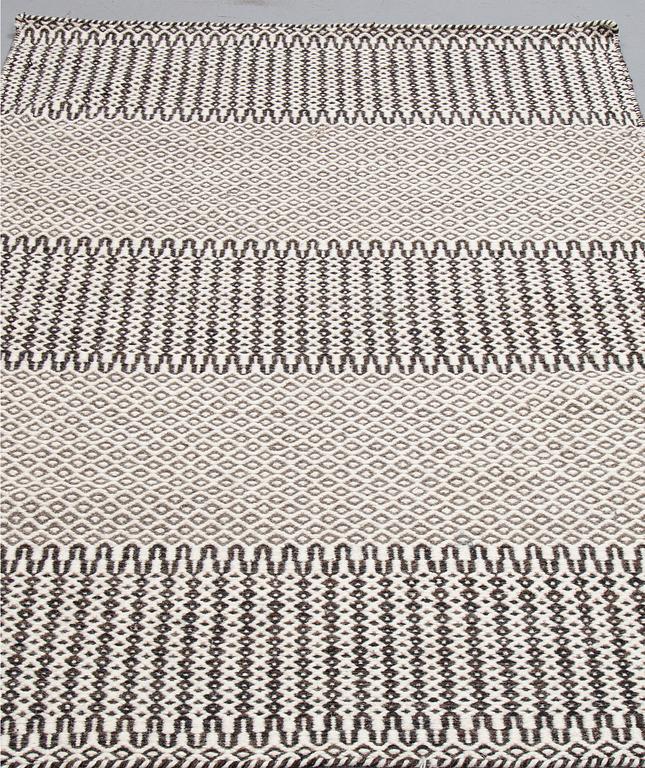 A CARPET, oriental flat weave, ca 180 x 120 cm.