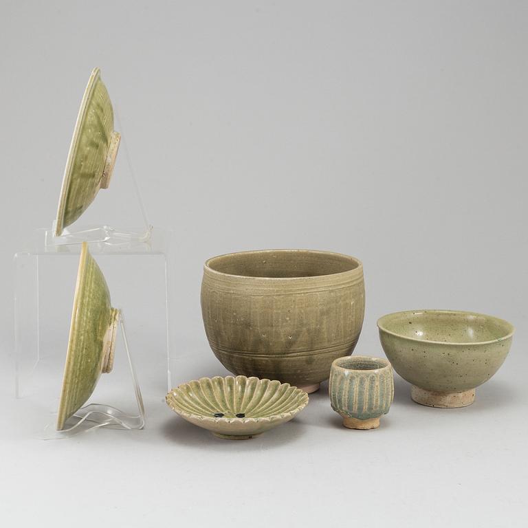 A group of olive green glazed bowls, South East Asia, 20th Century. (6 pieces).