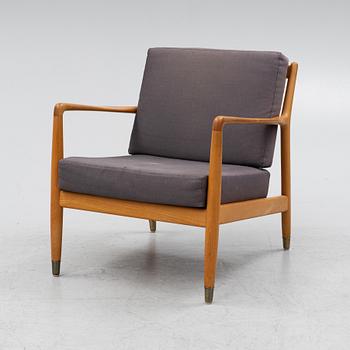 Folke Ohlsson, a beech 'USA-143' armchair, designed in 1953.
