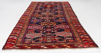 A semi-antique Anatolian runner, c. 409 x 159 cm.