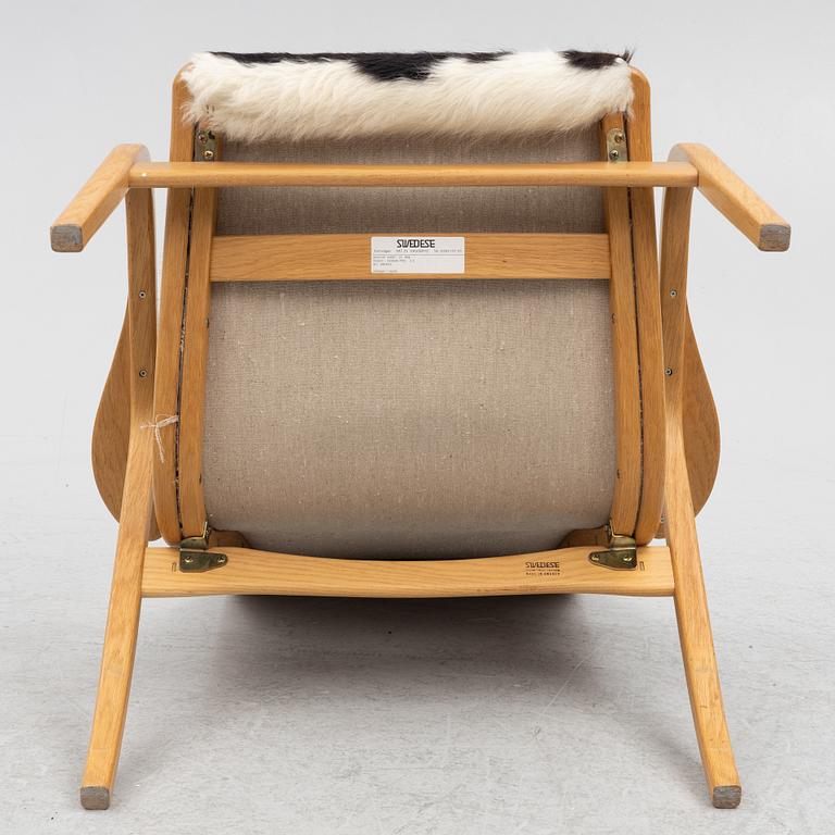 Yngve Ekström, an armchair with footstool, Lamino, Swedese.