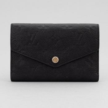 Louis Vuitton, a black Monogram Empreinte leather 'Curieuse' wallet, 2015.