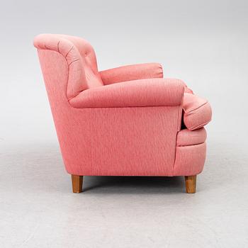Josef Frank, a model 678 sofa, Firma Svenskt Tenn, Sweden.
