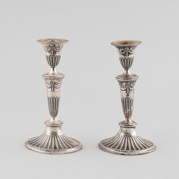 A pair of silver candlesticks from Stockholm, 1906.