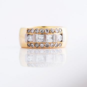 A ca 0.60 - 0.70 cts brilliant and baguette cut diamond ring by Bror Schalin, Östersund.