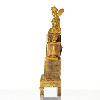 A French Empire ormolu mantel clock, early 19th century.