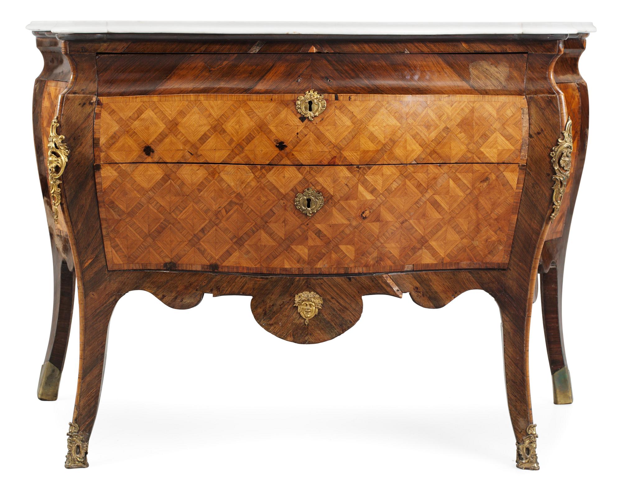 An Italian Rococo 18th century commode. - Bukowskis