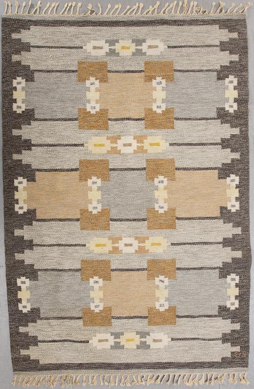 A signed flat weave carpet 220x160 cm.