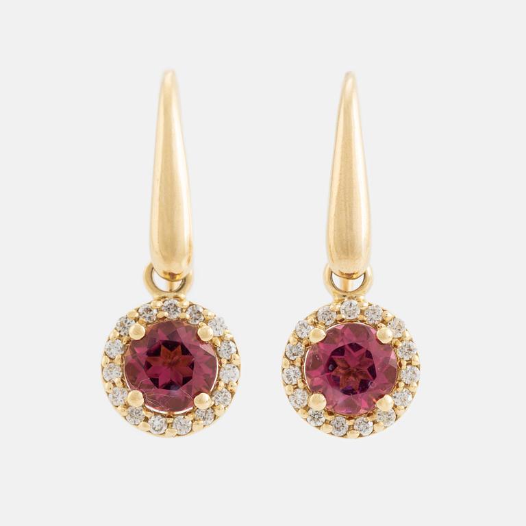 Pink tourmaline and brilliant cut diamond earrings.