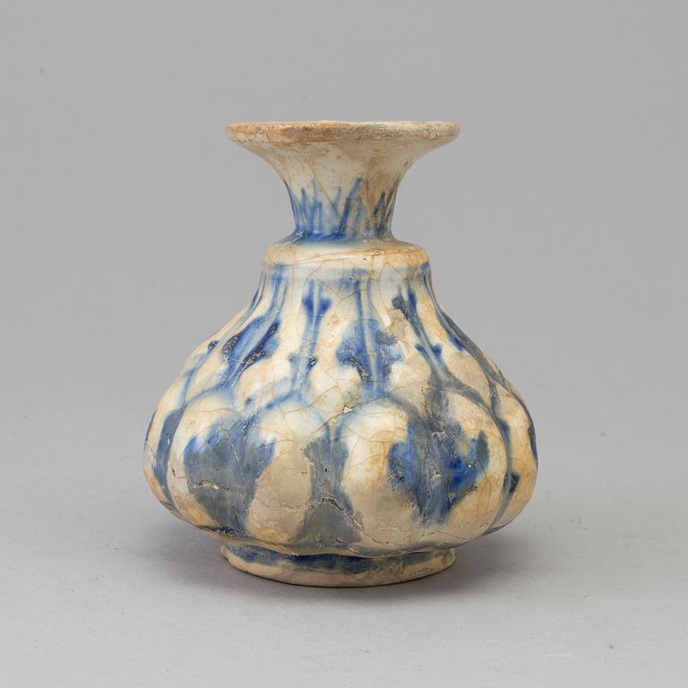 A 13th century persian pottery vase.