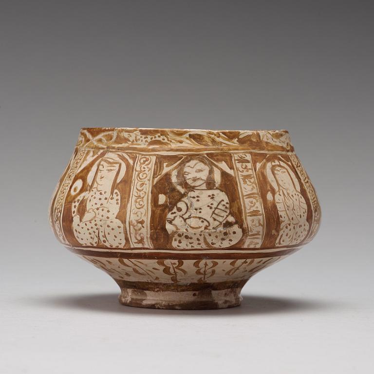 A BOWL, pottery with luster decor, height ca 10,5 cm, Persia/Iran 12th-13th century.