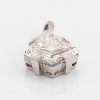 A platinum and step-cut diamond pendant.