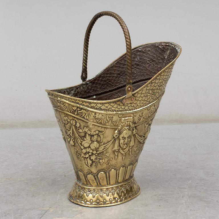 A 19th century brass coal basket.