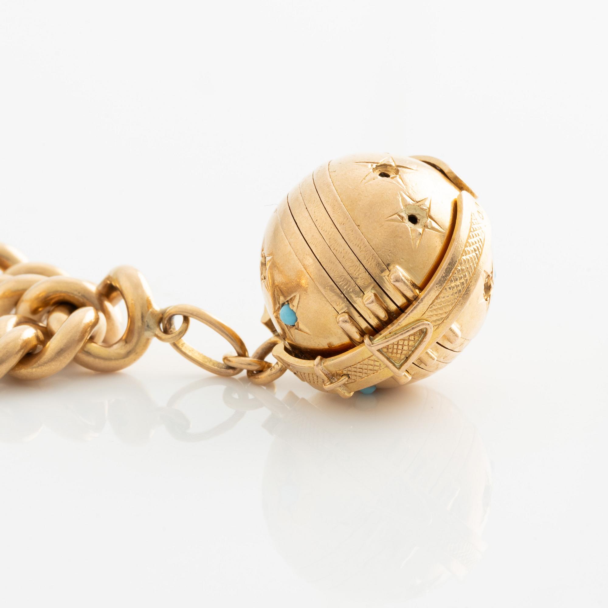 Armband, 18K guld med två stora berlocker.