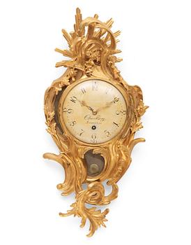 62. A Swedish Rococo gilt bronze wall clock by Claes Berg, Stockholm, master 1762-1784.