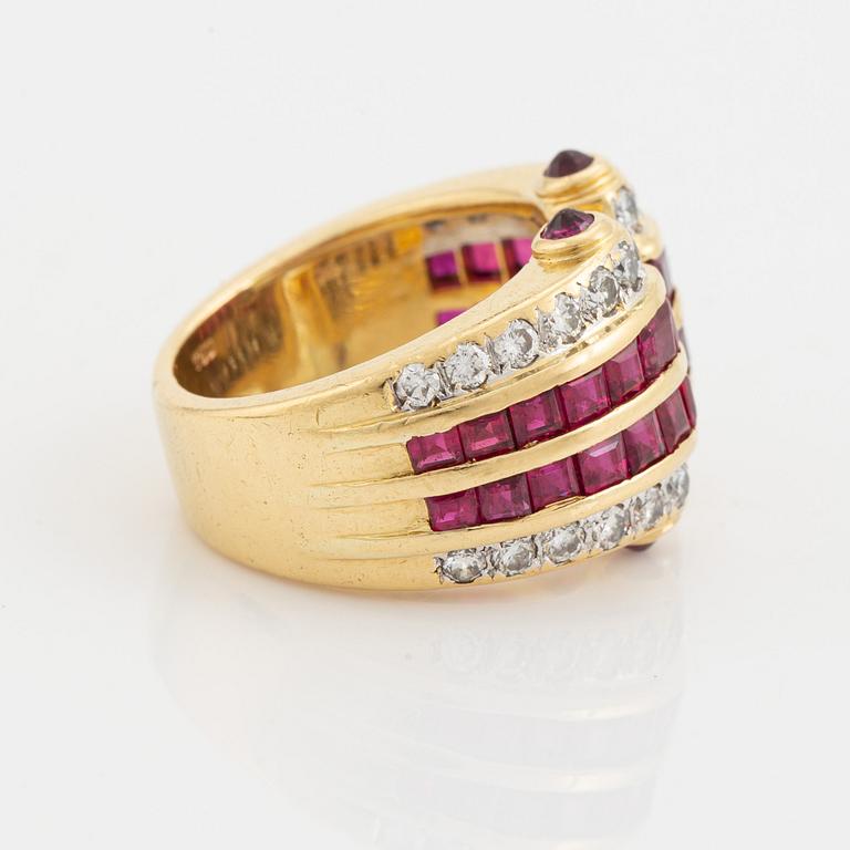 Step cut ruby and brilliant cut diamond ring.