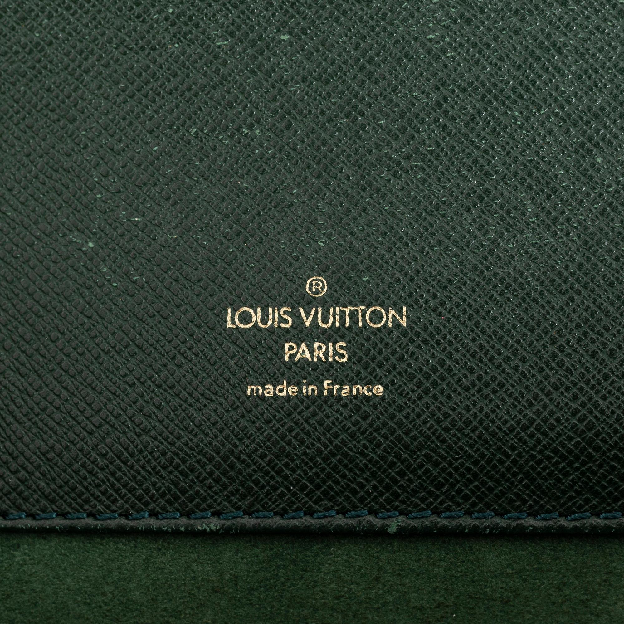 Louis Vuitton, a green Taiga 'Kourad' briefcase, 1997.
