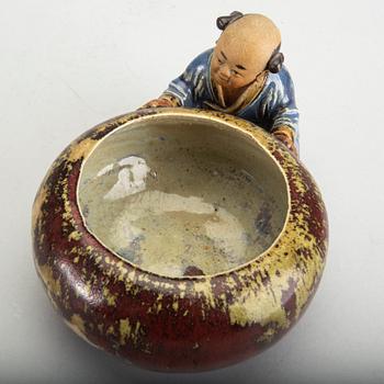 A Japanese 20th century signed porcelain figurine.