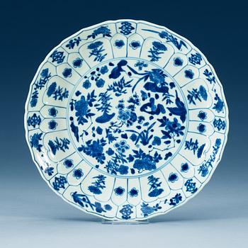 A blue and white dish, Qing dynasty, with Kangxi six character mark and of the period (1662-1722).