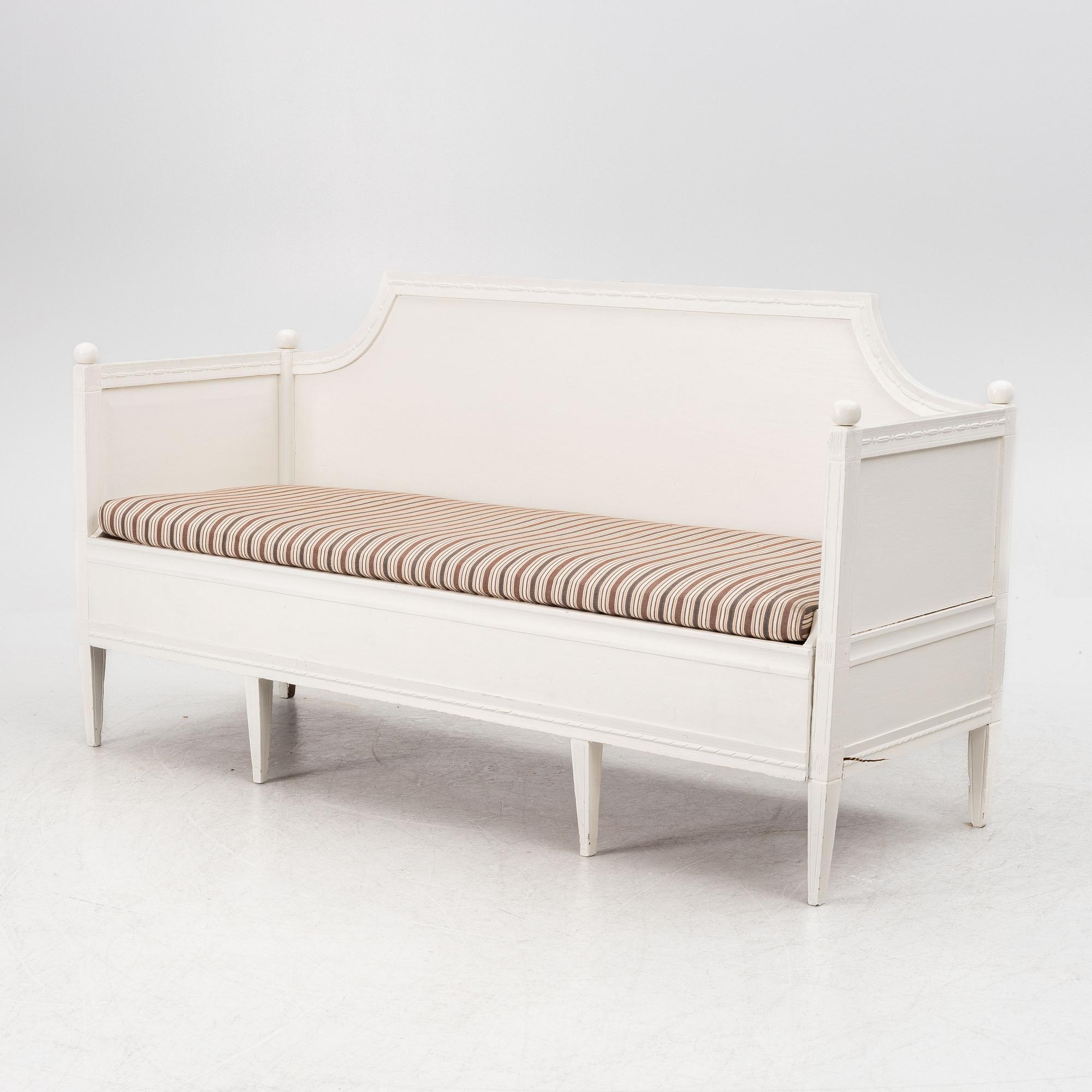 A late Gustavian sofa, early 19th century.