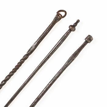 A set of three wrought iron fireplace pokers, 18th / 19th century.