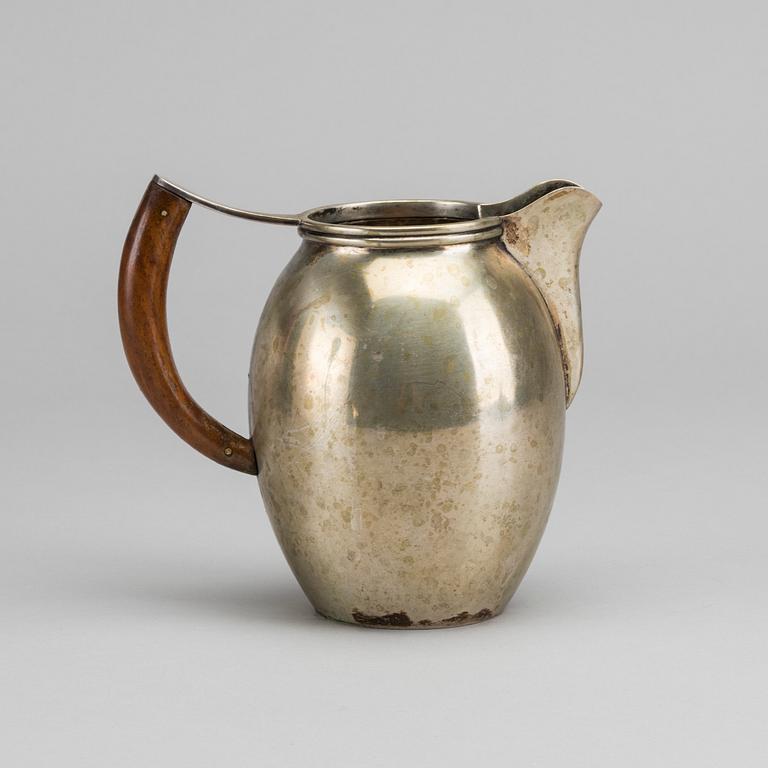 A Danish 20th century silver Pitcher, Copenhagen 1946 assay mark J Siggaard weight ca 305 gr.