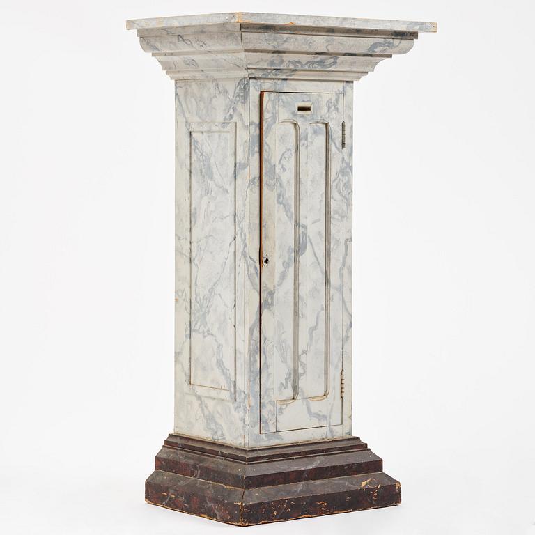 A Swedish column-shaped cabinet late 19 th century.