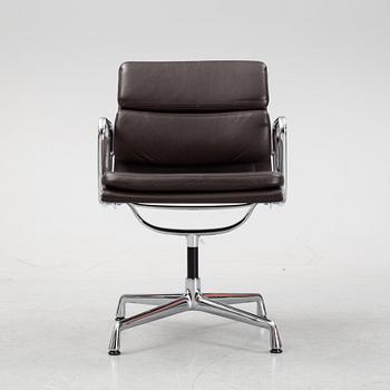 An EA 208 Soft Pad swivel chair by Charles and Ray Eames for Vitra, dated 2010.