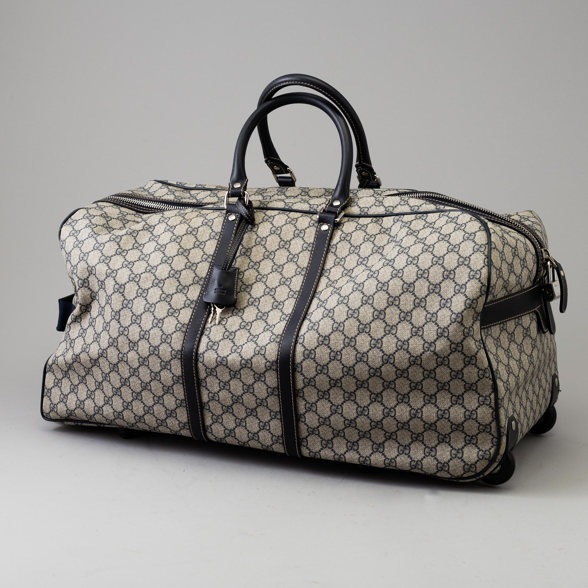 VÄSKA/RULLVÄSKA, Gucci.