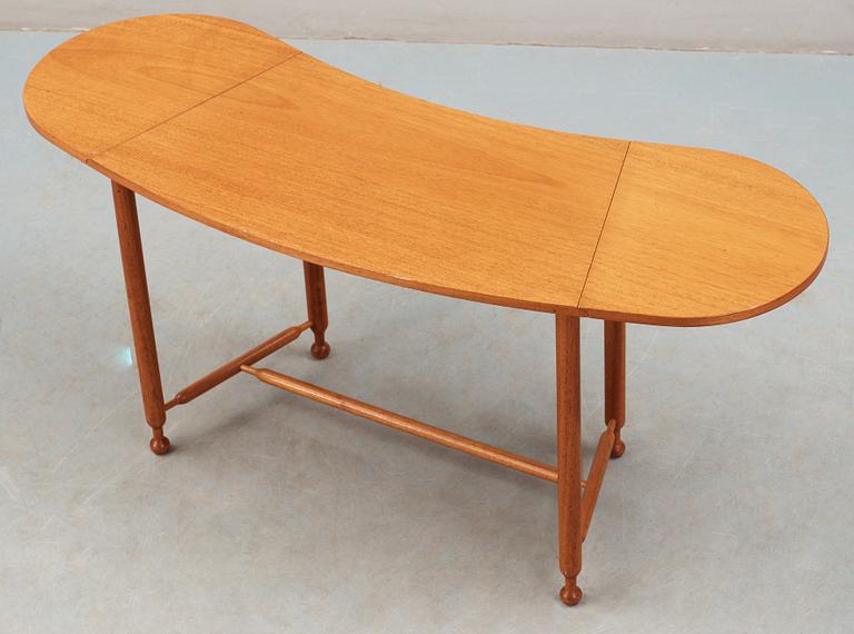 A Josef Frank mahogany table by Svenskt Tenn, model no 1333.