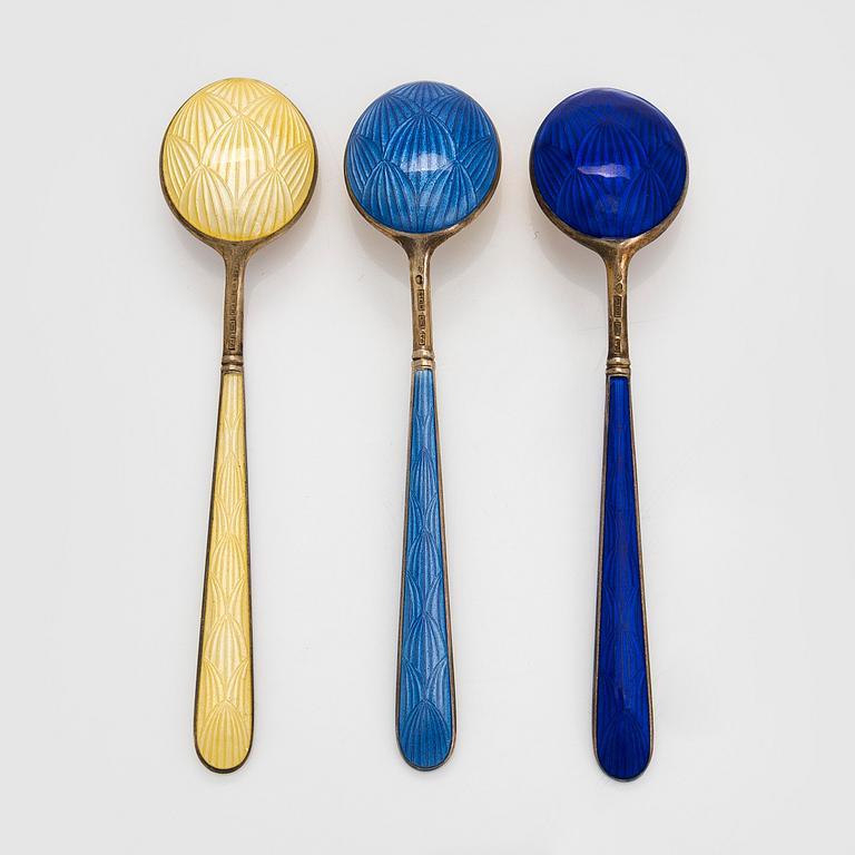 Tillander, a 10-piece set of enamelled and gilt silver coffee spoons, Helsinki.