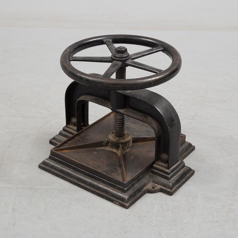 A cast iron book press from around year 1900.