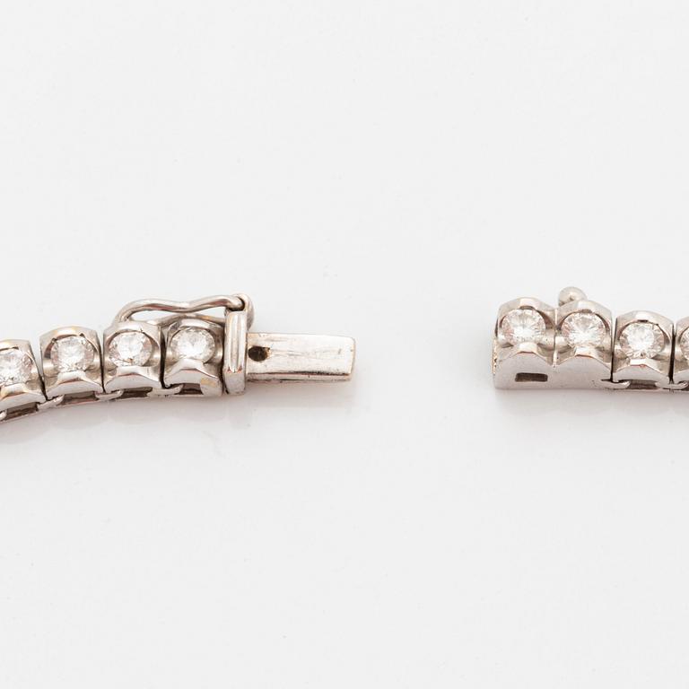 Collier rivière 18K vitguld runda briljantslipade diamanter.