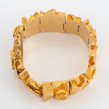 An 18K gold bracelet designed by Björn Weckström for Lapponia.