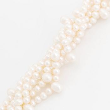 A cultured freshwater pearl necklace and bracelet.