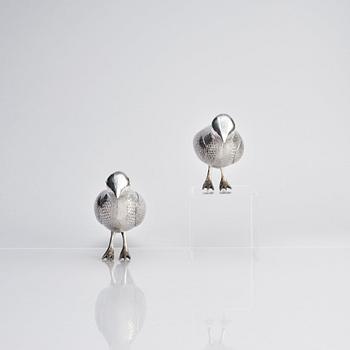 A pair of persian silver pigeons, the Qajar dynasty (1789–1925).