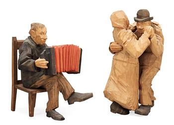 175. Axel Petersson Döderhultarn, Seated accordionist and dancing couple.