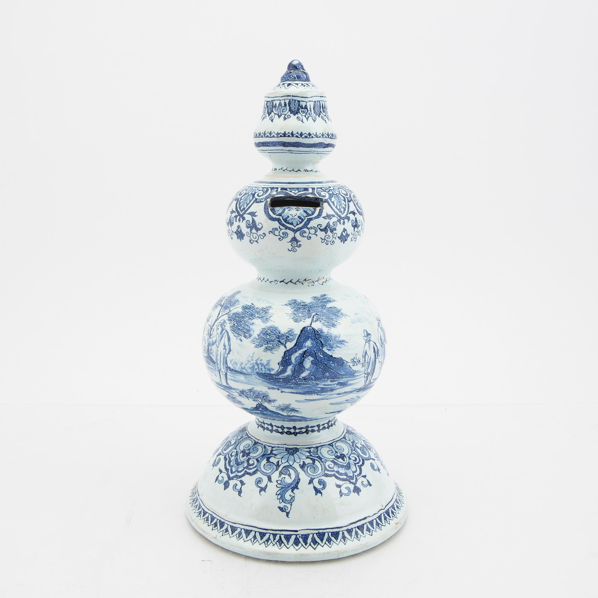 An 18th/19th century signed faiance moneybox. - Bukowskis
