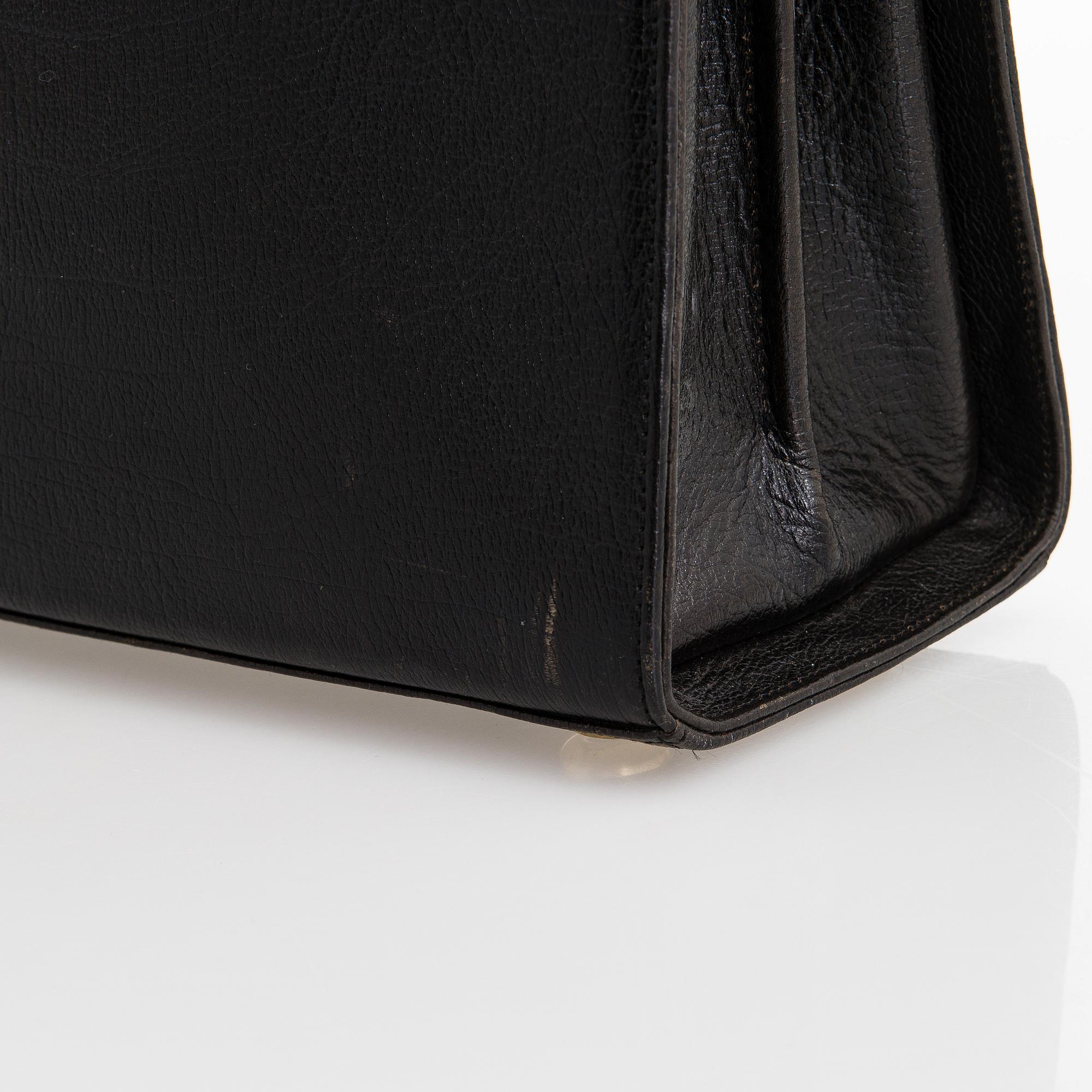 Mulberry, a leather briefcase.